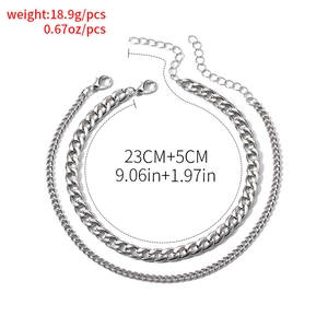 Silver multi-layered Cuban chain anklet set with size specifications on white background