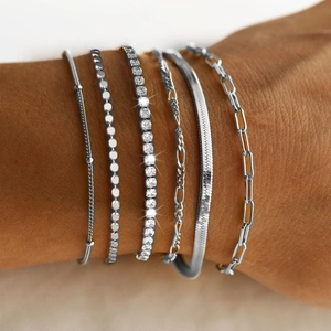6-piece silver stackable bracelet set including herringbone, paperclip, and tennis chains