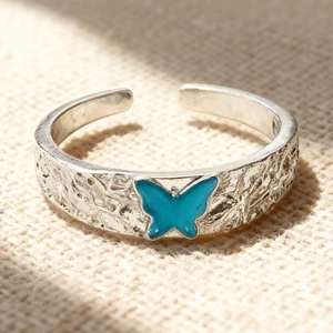 Adjustable silver butterfly ring with blue enamel and textured band for women