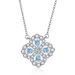 Elegant silver four-leaf clover necklace featuring light blue pear-cut stones and zircon halo