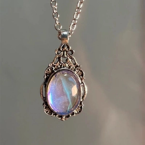 Vintage alloy cross necklace with iridescent purple enamel and antique silver finish