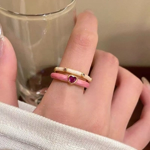 French macaron enamel ring set with heart zirconia stone on model's hand