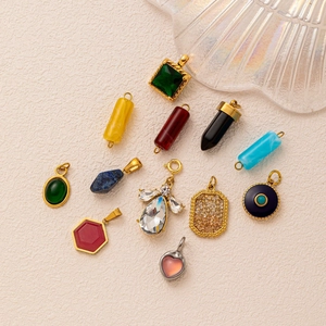 Various geometric 18K gold-plated stainless steel pendants with colorful zircon stones