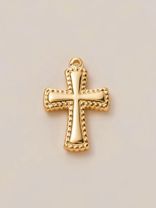 Detail of 18K gold plated cross pendant featuring beaded edges and a polished center
