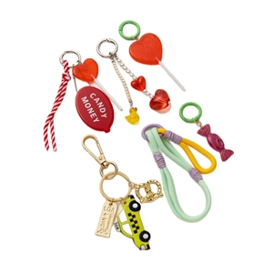 Colorful beaded keychain set with NYC taxi, candy charms and woven rainbow rope pendants