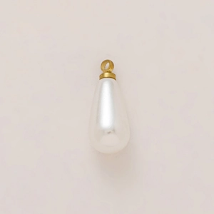 Detail of waterdrop pearl pendant with 18K gold plated clasp on a soft pink background