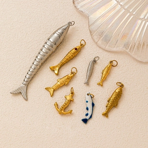 Marine ocean beach pendants in gold and silver finish with fish and anchor charms