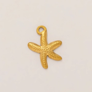Close-up of golden starfish pendant with granular texture and vacuum plated 18K gold finish