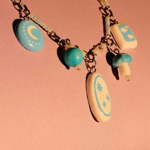 Handmade 18K gold plated necklace with blue moon star and mushroom ceramic charms