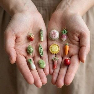 Handcrafted 18K gold-plated vegetable pendants set featuring carrot, pea and strawberry