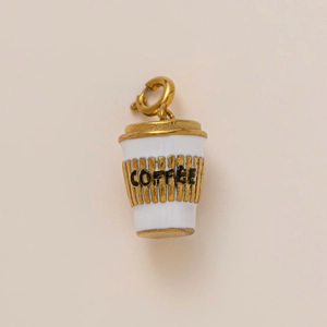 Detailed view of a mini white coffee cup pendant with gold-plated spring clasp and engraving