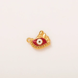 Macro-opname van 18K vergulde boze oog hanger met rood emaille en kralenrand detailwerk