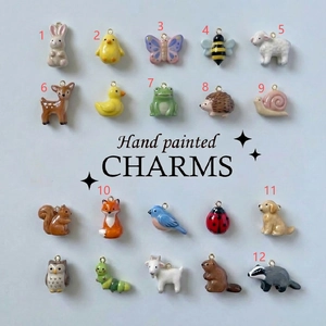 Detailed collection of twenty unique hand-painted ceramic animal charms for jewelry making