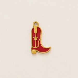 Detail showing red enamel western cowboy boot pendant with gold star and 18k plating