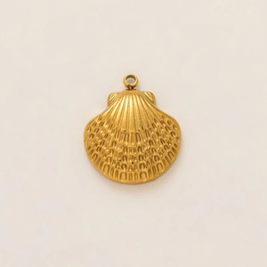 Macro shot of 18k gold plated stainless steel seashell pendant with radiant textures