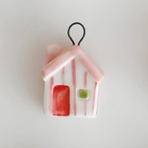 Detail view of 18K gold plated house pendant with colorful hand-painted enamel finish