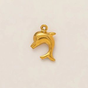 Detail of a 18k gold plated stainless steel dolphin pendant with a polished finish