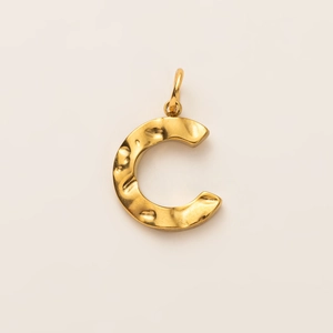 Detailed close-up of letter C pendant with vintage hammered texture and gold plating finish