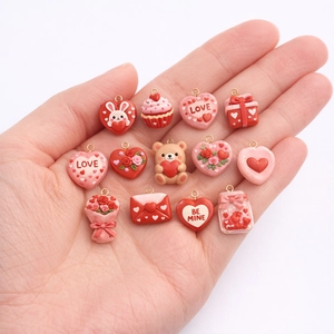 Handheld set of romantic Valentine charms with red heart and 18K gold plated loops