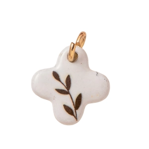 White ceramic leaf pattern clover pendant with a golden metal ring for necklaces