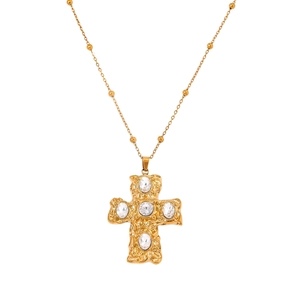 18k gold plated stainless steel cross necklace with crystal inlays on white background