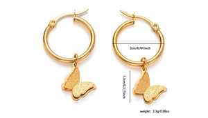 Macro dimension view of golden butterfly hoop earrings with polished and frosted textures