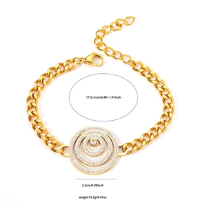 Detail of a gold layered concentric circle pendant necklace with white crystals