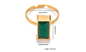 Detail view of gold vintage ring with green emerald stone and size dimensions