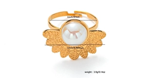 Detailed view of adjustable golden titanium steel ring with pearl and fan leaf texture
