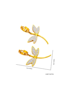 Detailed view of gold dragonfly earrings with white rhinestones and size measurements