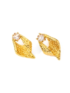Detailed macro of gold vintage titanium stud earrings with textured folds and square zircon