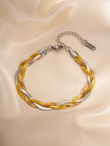 Detailed macro view of the three-tone braided metal snake chain with a lobster clasp