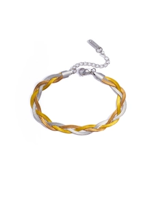 Detailed macro of tricolor braided snake chain bracelet with stainless steel lobster clasp
