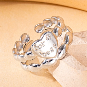 Silver chain ring with heart pendant featuring for best engraving on stone background