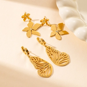 Elegant gold titanium steel floral and butterfly earrings set with sparkling crystals
