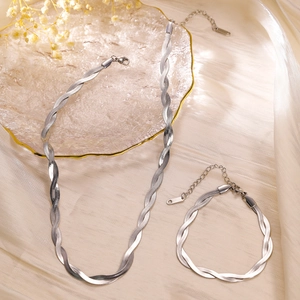 Polished silver stainless steel snake chain necklace and bracelet set in spiral design