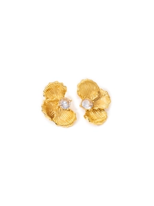 Close-up of golden flower stud earrings with radiant texture and center zircon stone