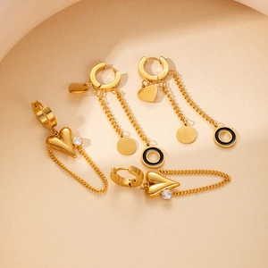 Elegant gold titanium steel heart earrings with chain tassels and black enamel detail
