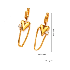 Detail view of gold heart chain earrings with dimensions 5cm height and 1.5cm width