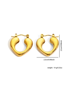 Detail view of gold heart earrings showing dimensions 2.5cm height and 2.3cm width
