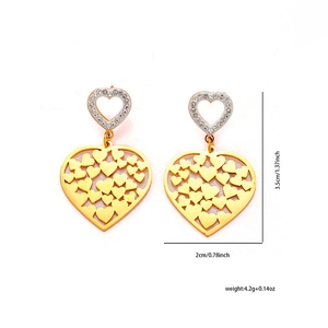 Detailed view of hollow heart earrings in gold with precise size and weight measurements