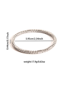 Detailed view of silver titanium steel bangle showing precise dimensions and beaded texture