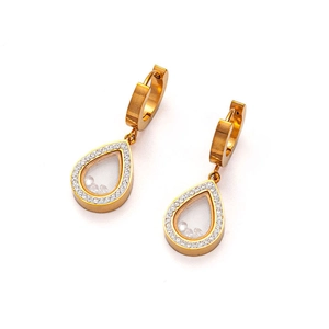 Detail of gold water-drop huggie earrings featuring floating gems and pavé zircon border