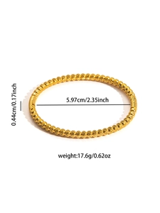 Detailed dimensions of gold textured geometric bangle with 5.97cm inner diameter