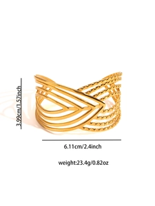 Detail view of gold geometric layered open cuff bracelet with dimensions and weight