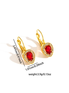 Detailed view of red teardrop earrings with gold plating and white zircon accents