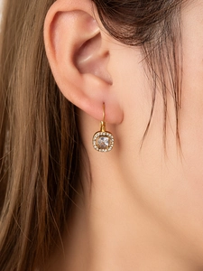 Close-up of 18K gold plated leverback earrings with square halo cushion cut stones
