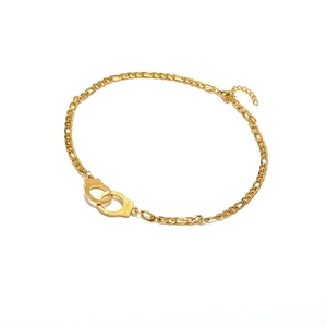 Golden Figaro necklace featuring freedom handcuffs pendant with adjustable chain