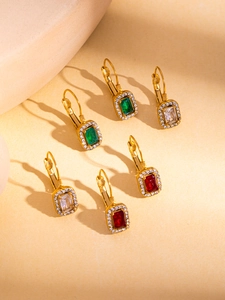 Detailed close-up of 18K gold plated drop earrings with emerald, ruby and clear crystals