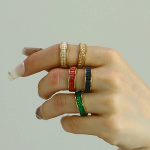 Set of five stackable gold titanium rings with colorful rectangular zircon gemstones